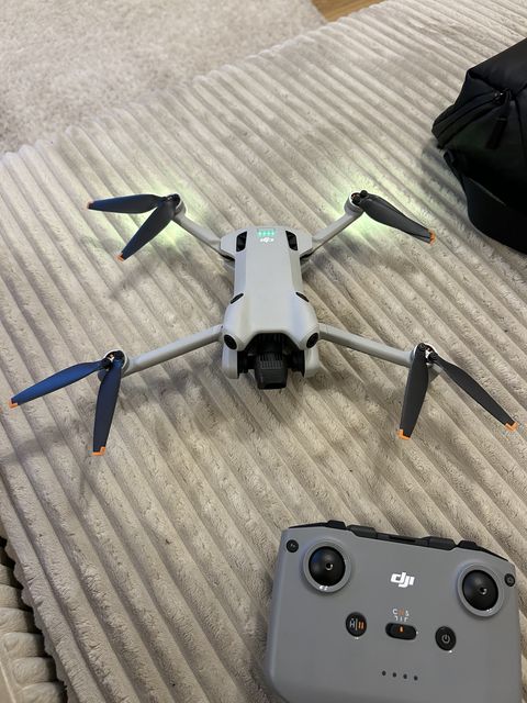 DJI Mini 3 Pro with its controller