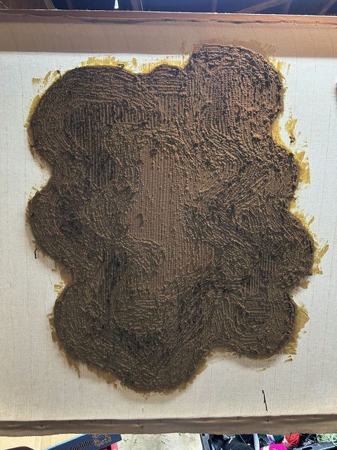 Back of the rug coated in glue